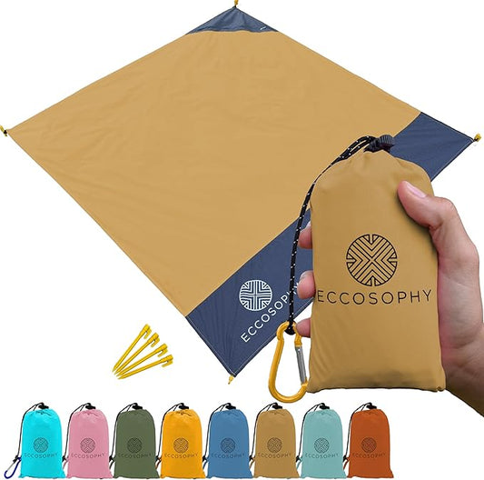 ECCOSOPHY Sand Proof Beach Blanket - Waterproof Picnic Blanket 60x55 Outdoor Compact Pocket Blanket Lightweight Ground Cover for Hiking Camping Festivals Sports Travel with Bag & Stakes (Caramel)